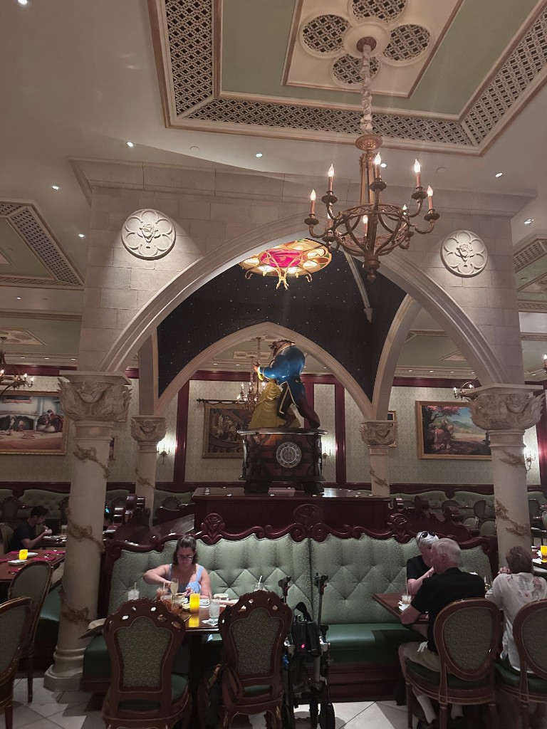The Beast on the music box in the Be Our Guest ballroom