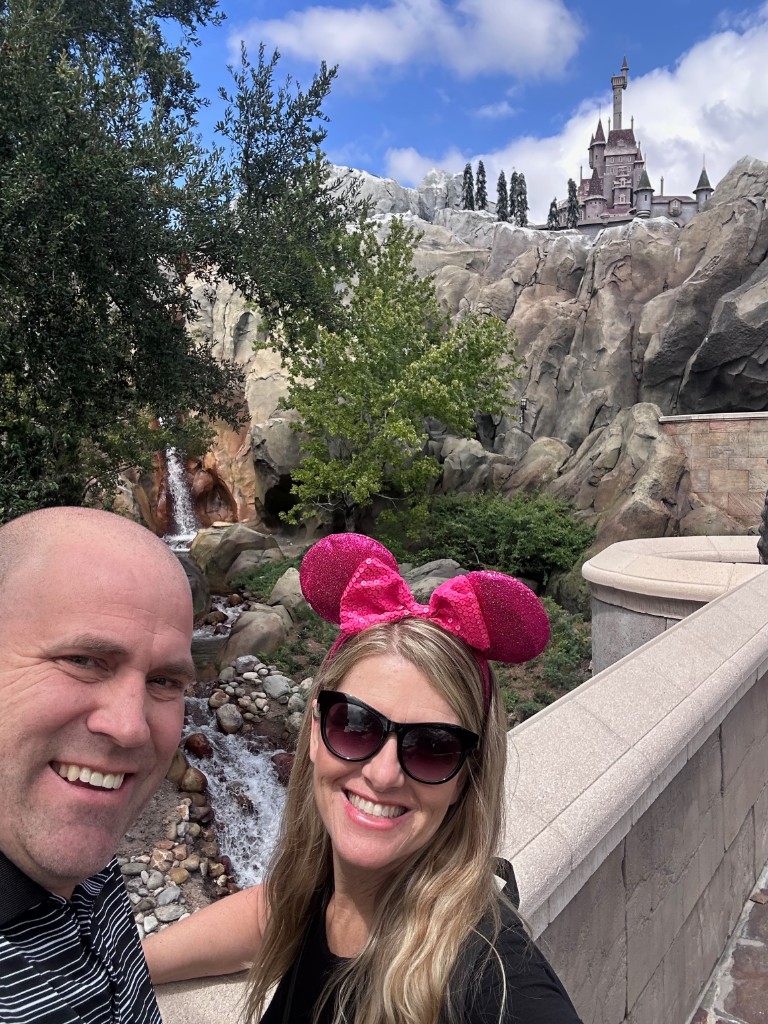 Ryan and Sarah with the Beast’s castle on the rocks behind them
