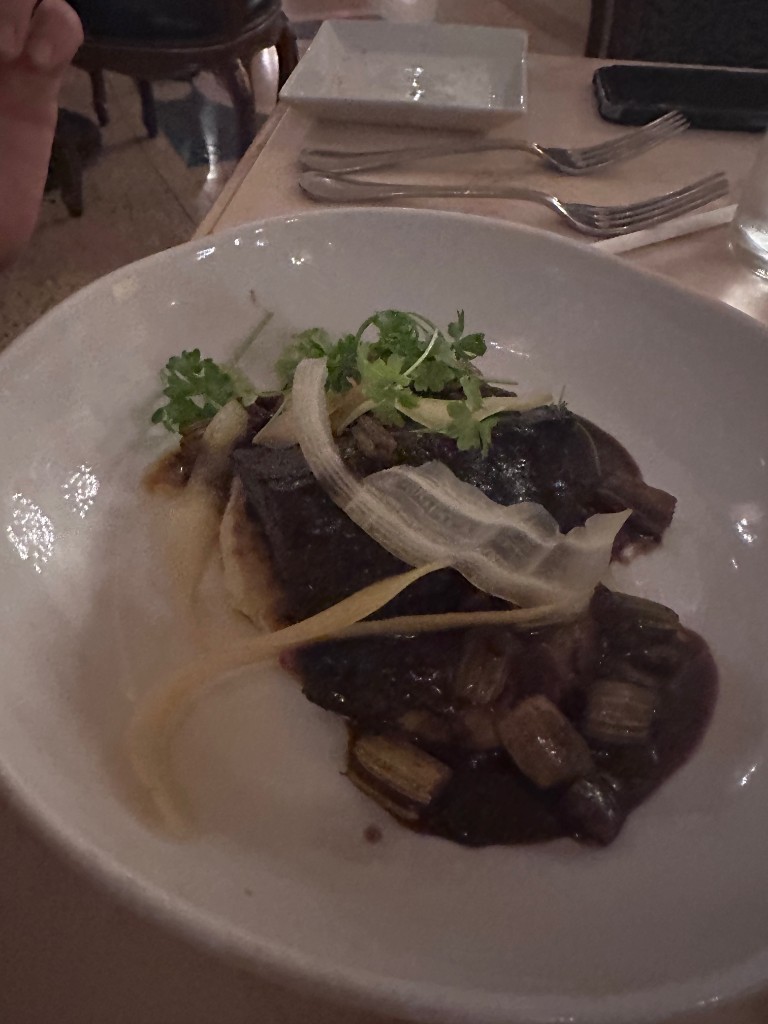 A plated entrée at Be Our Guest