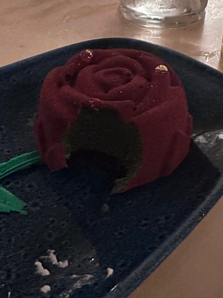A bite taken out of the grey stuff rose