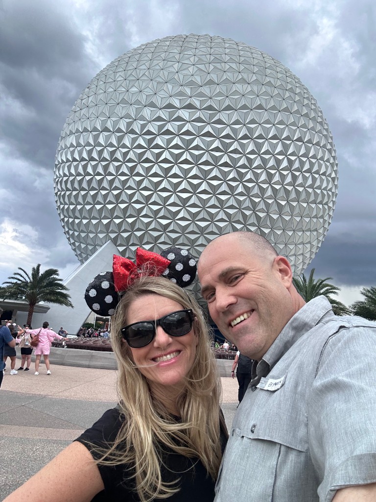 Ryan and Sarah in front of Spaceship Earth at EPCOT