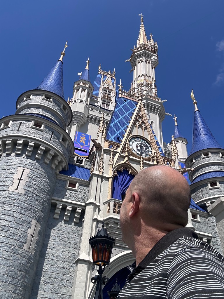 Ryan in front of the Cinderella Castle clock tower