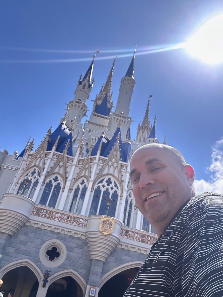 Ryan selfie under the sun with Cinderella Castle
