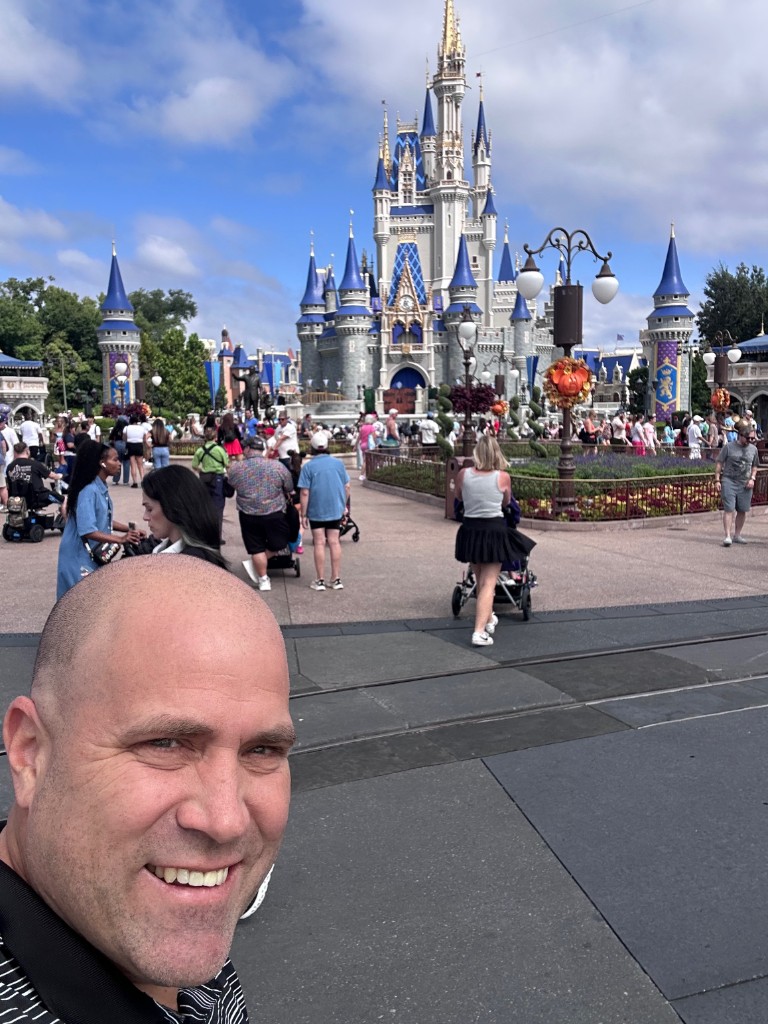 Ryan selfie with Cinderella Castle behind him