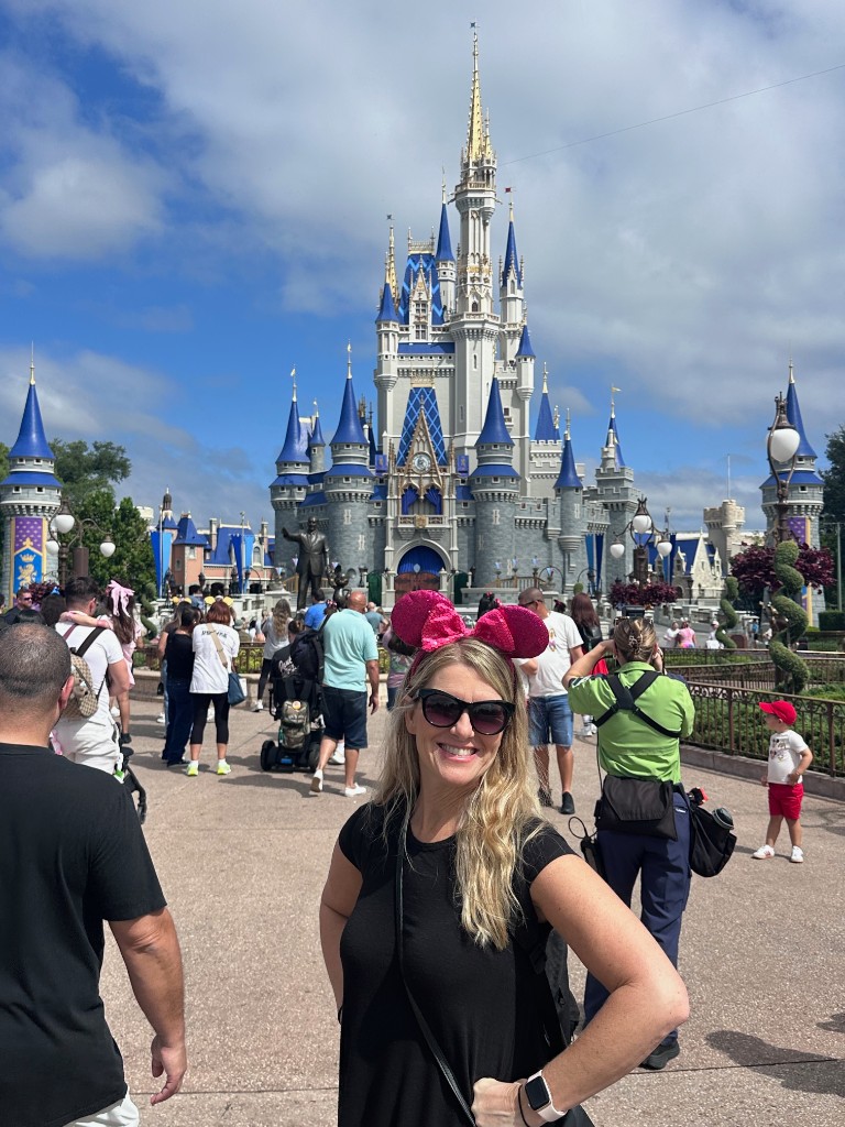 Sarah in front of Cinderella Castle