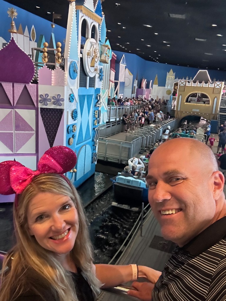 Ryan and Sarah in the it’s a small world loading area