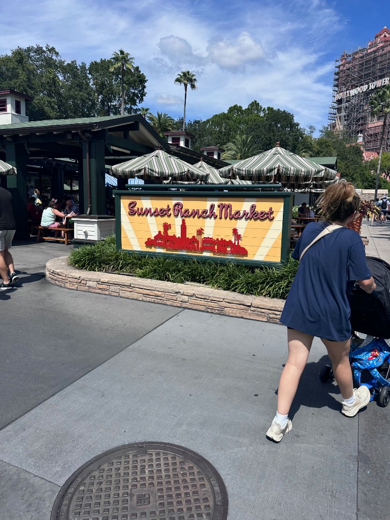 Sunset Ranch Market sign and outdoor tables
