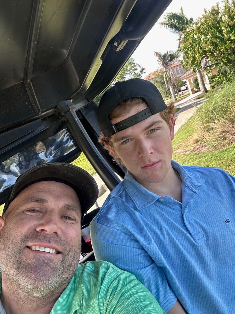 Ryan and Bryce in the cart at Eagle Creek