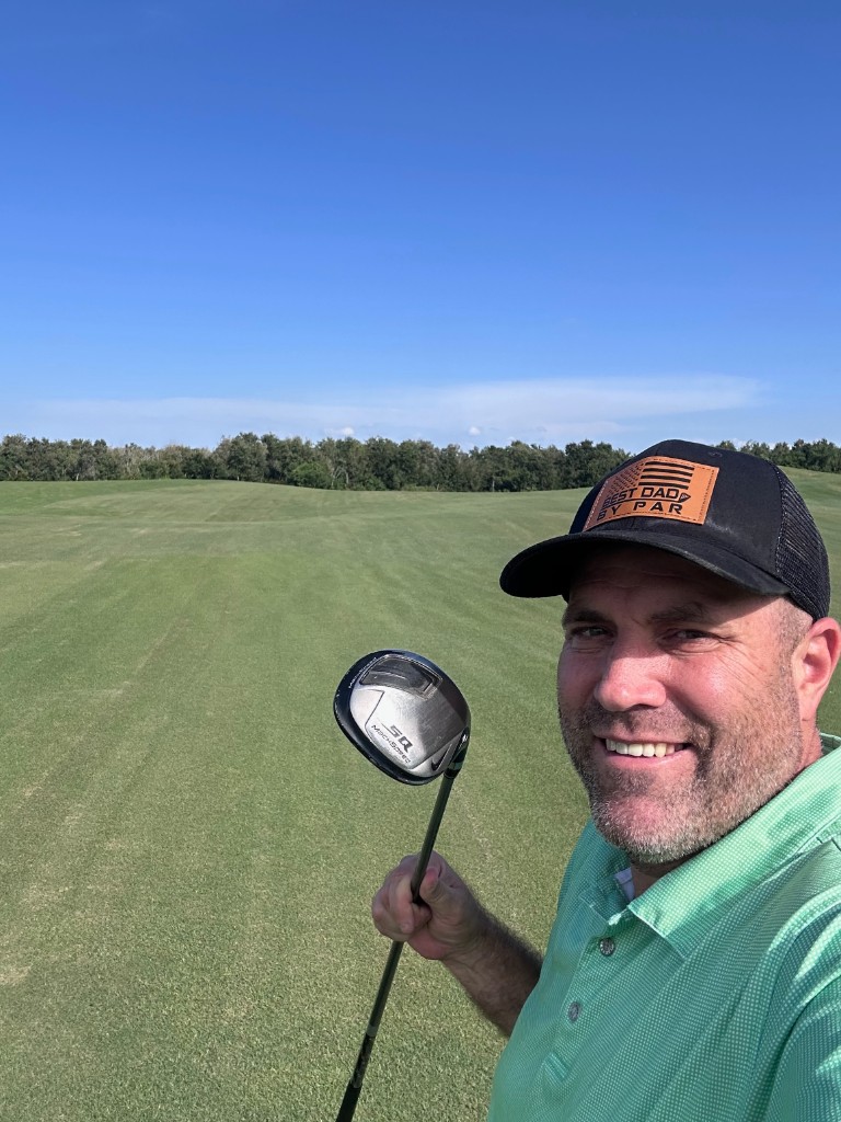 Ryan on the fairway at Eagle Creek with driver