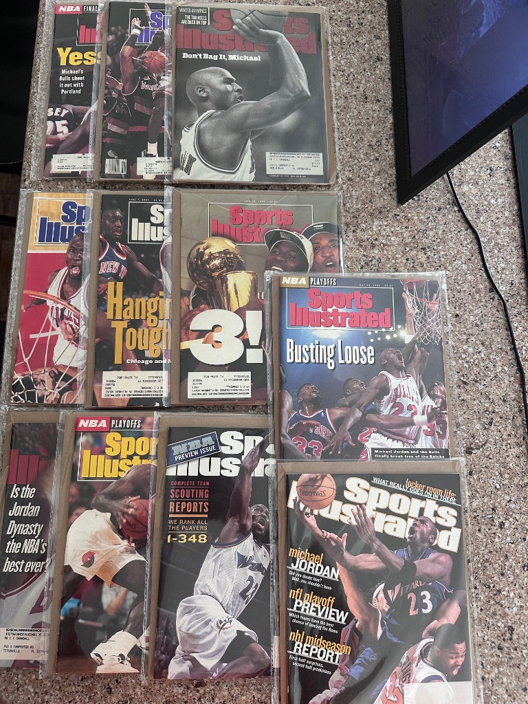 Eleven sleeved Michael Jordan Sports Illustrated covers from the Marketplace pickup
