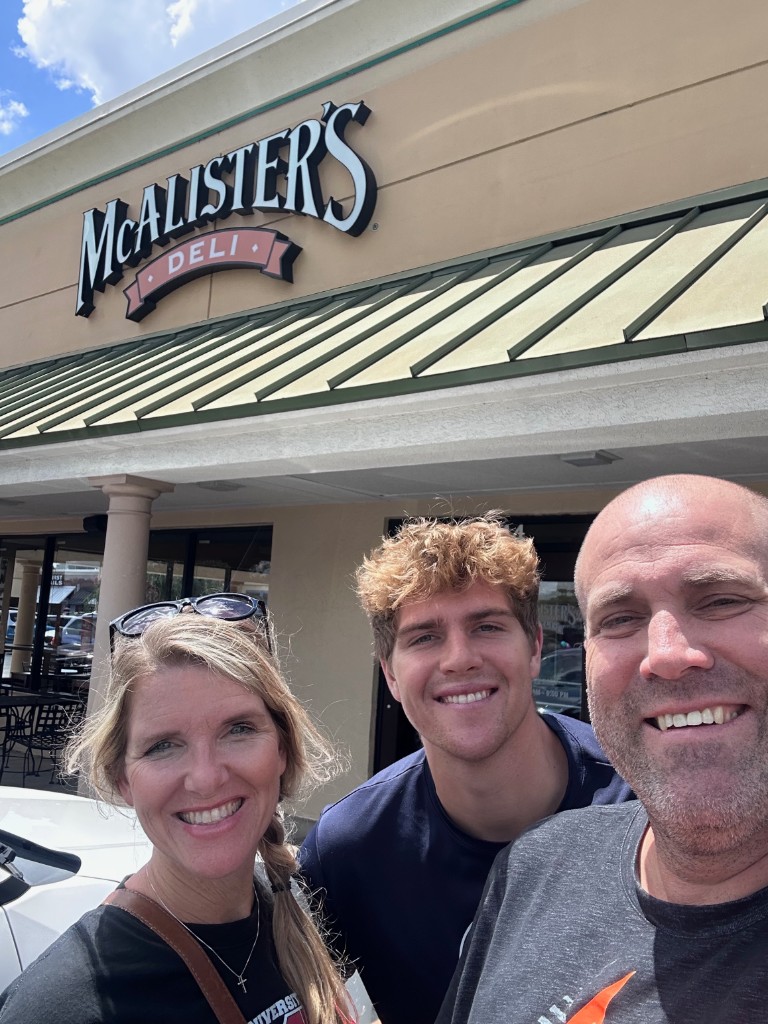 Ryan, Sarah, and Drew outside McAlister's Deli in Tampa